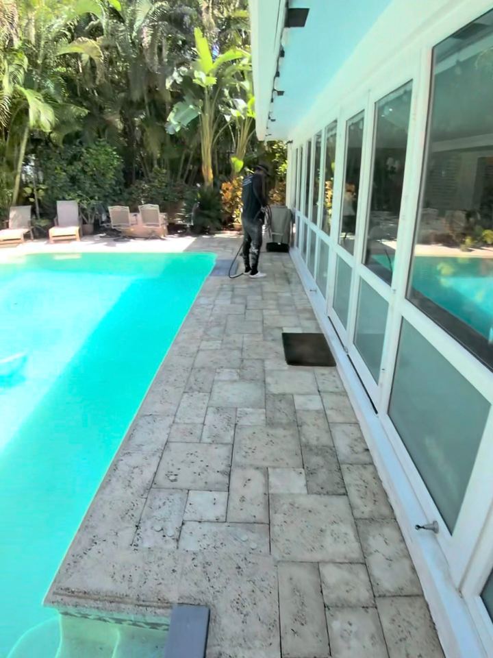 The same pool deck light and clean after pressure washing