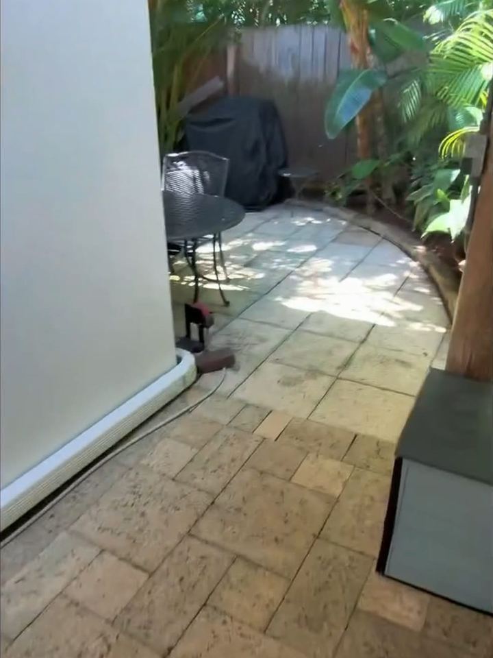 The same side walkway clean and bright after pressure washing